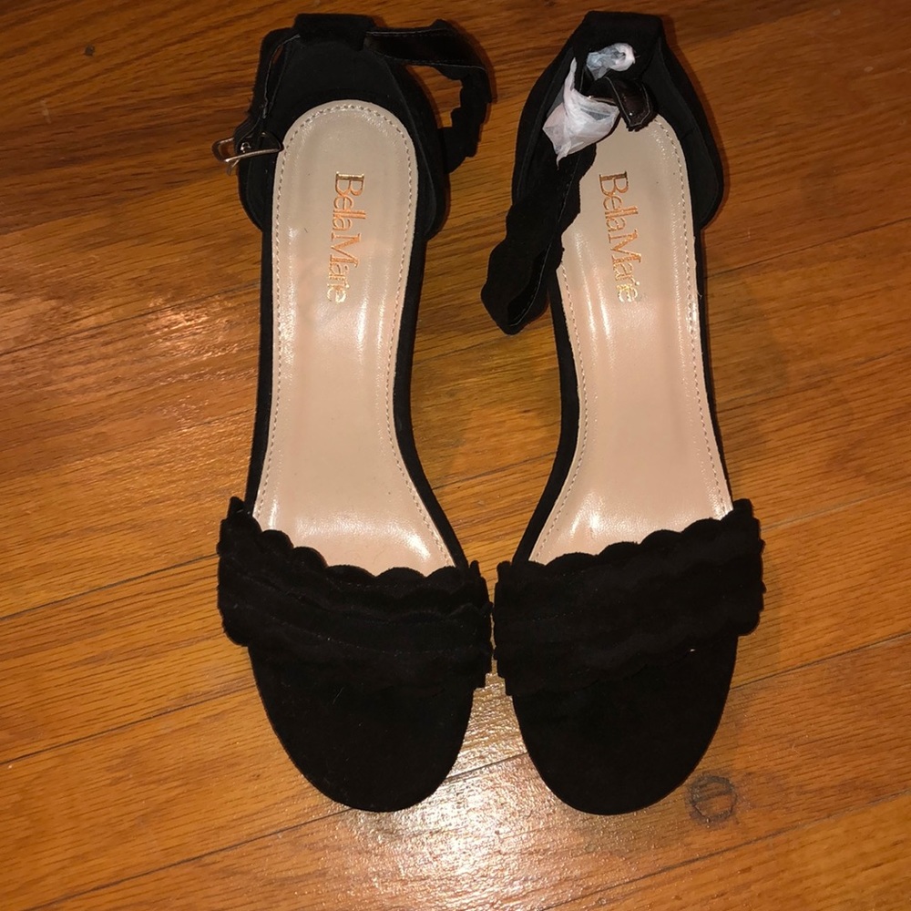 Scalloped Open toed block heels.